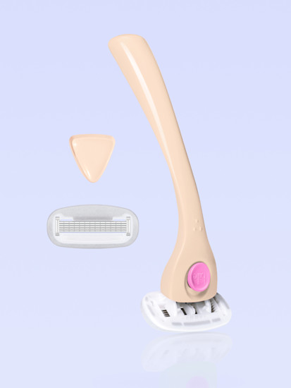 Beige women's razor with pink button and replaceable blade cartridge on light blue background.