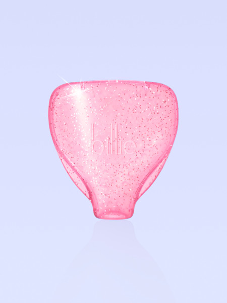 pink sparkle travel case on a light periwinkle background