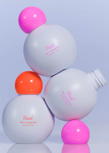floof dry shampoo bottles stacked