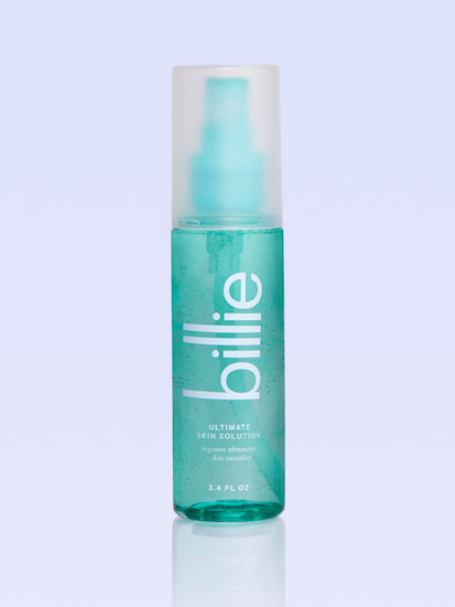 teal ultimate skin solution spray bottle against gray background