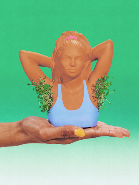 Terracotta sculpture of a figure in blue swimwear with sprouting plants in armpits, held by a hand with yellow nail polish.