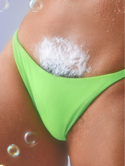 Woman with Billie V Smooth shave gel & cleanser lathered onto her pubic area