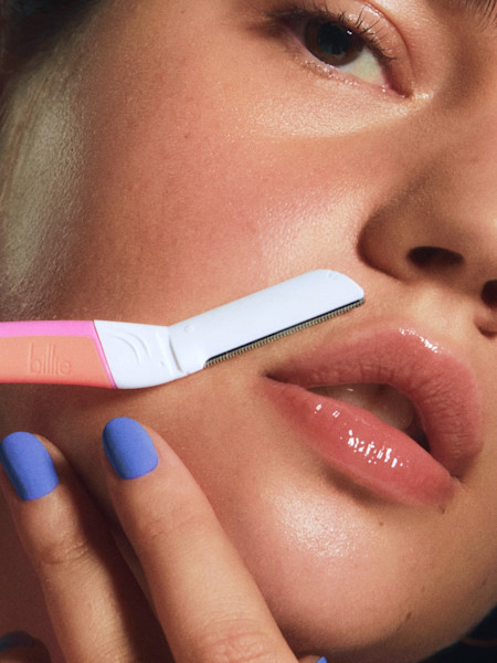 model using malibu dermaplane on her upper lip