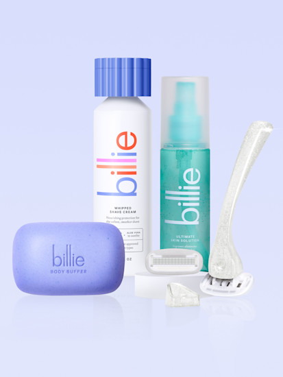 Billie shaving products including purple body buffer, white shave cream, teal skin solution spray, and razor on light blue background.