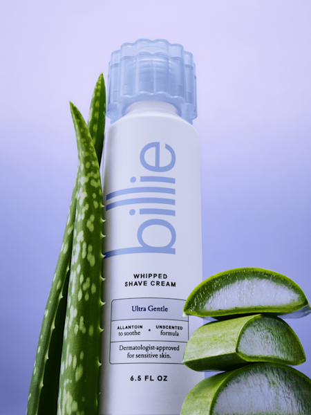 Ultra gentle whipped shave cream bottle with aloe leaves