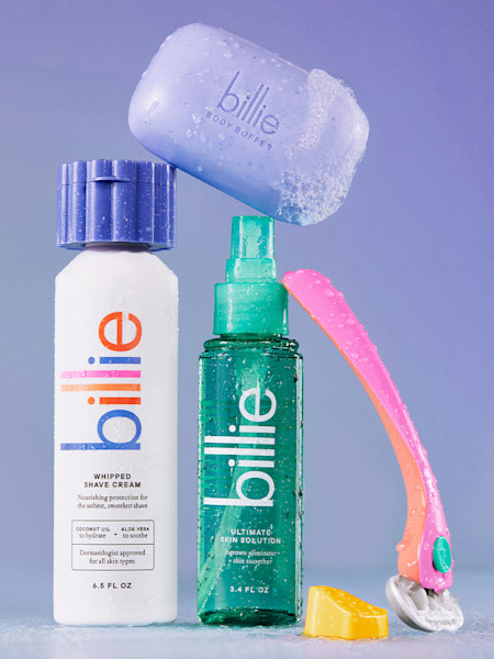 Lavender whipped shave cream, body buffer, ultimate skin solution, and pink and teal razor with yellow magnetic holder