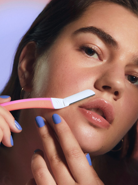 model using malibu dermaplane on her upper lip